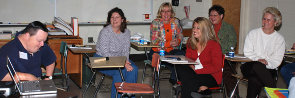 Billy Schulz presents to a group of teachers